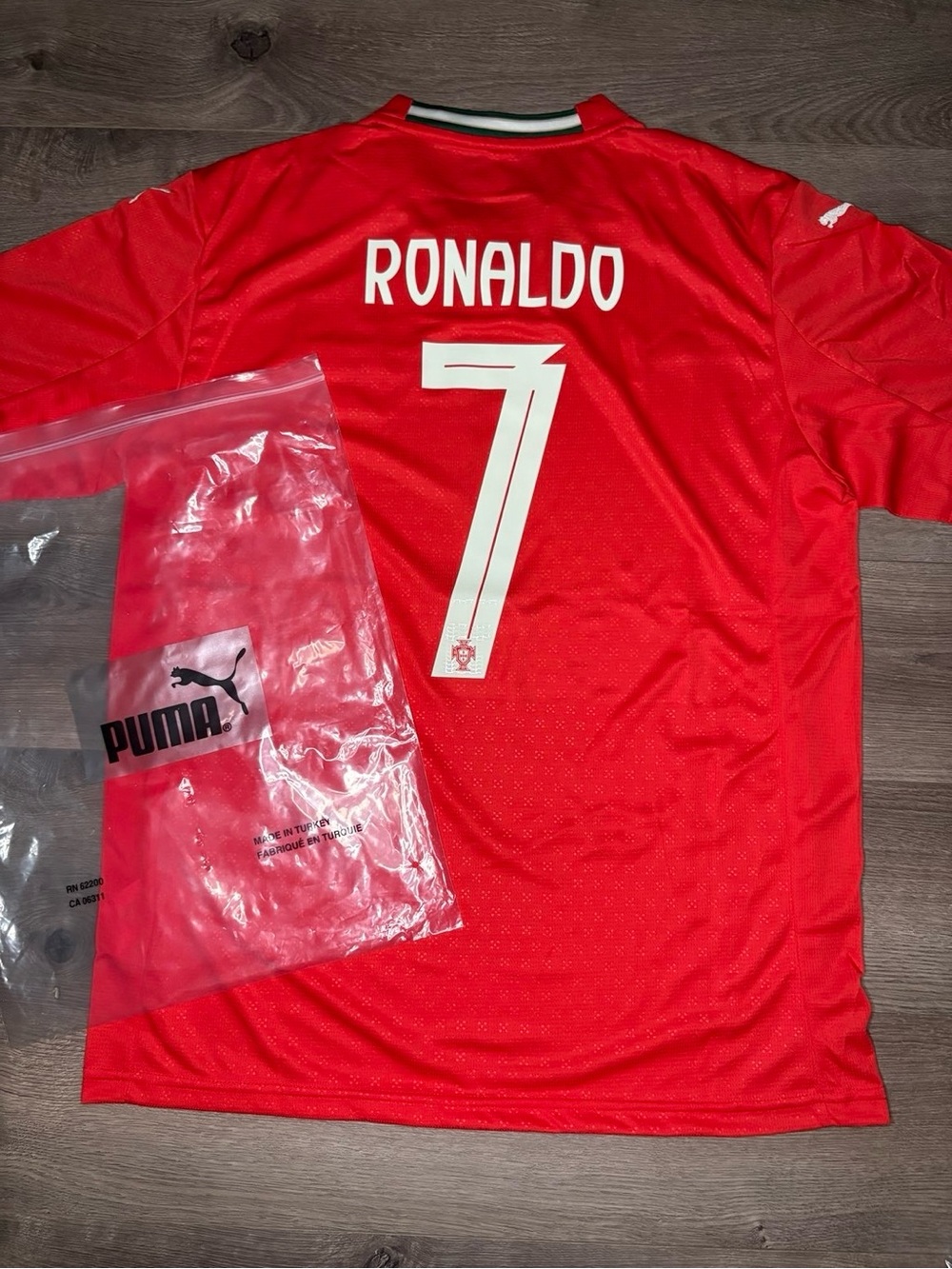 Puma Men’s SIZE L Red Ronaldo 7 Football Jersey with White Numbering
